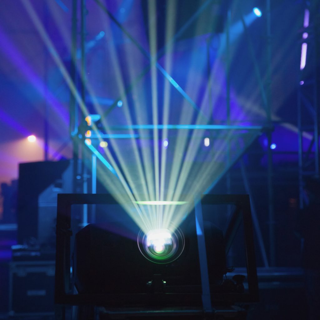 Laser lights illuminating music venue